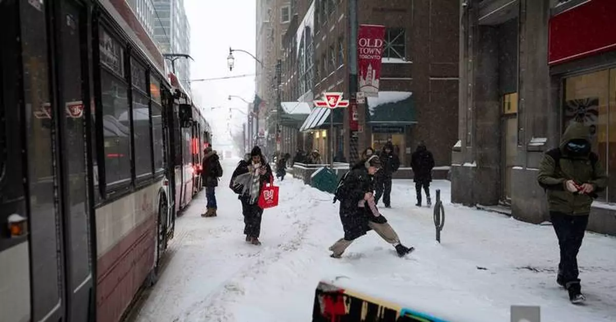 Toronto schools closed and commuters face delays as heavy snow blankets southern Ontario