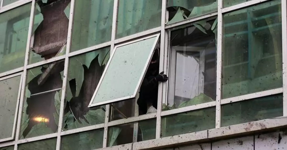 Islamic State group claims attack on a Kabul restaurant that killed 7, including a Chinese national