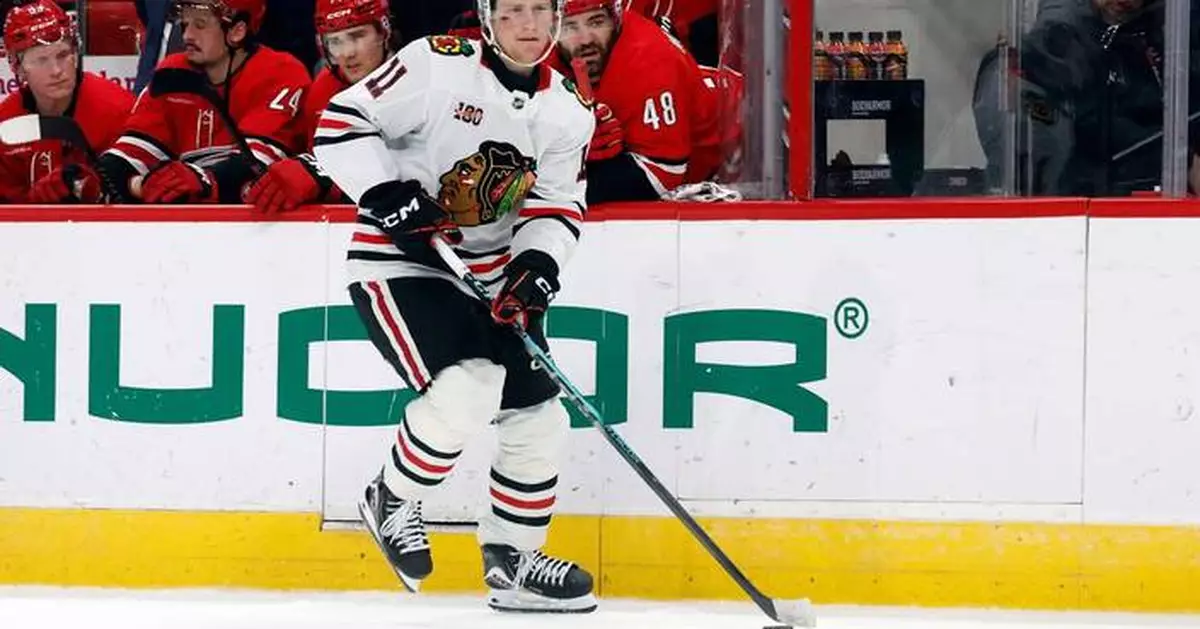 Oliver Moore scores in shootout on 21st birthday, leads Blackhawks to 4-3 win over Hurricanes