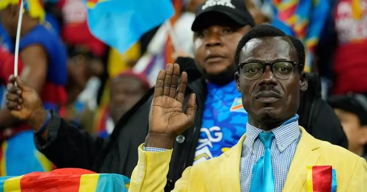 Statuesque Congo fan 'Lumumba' stands above all others at Africa Cup