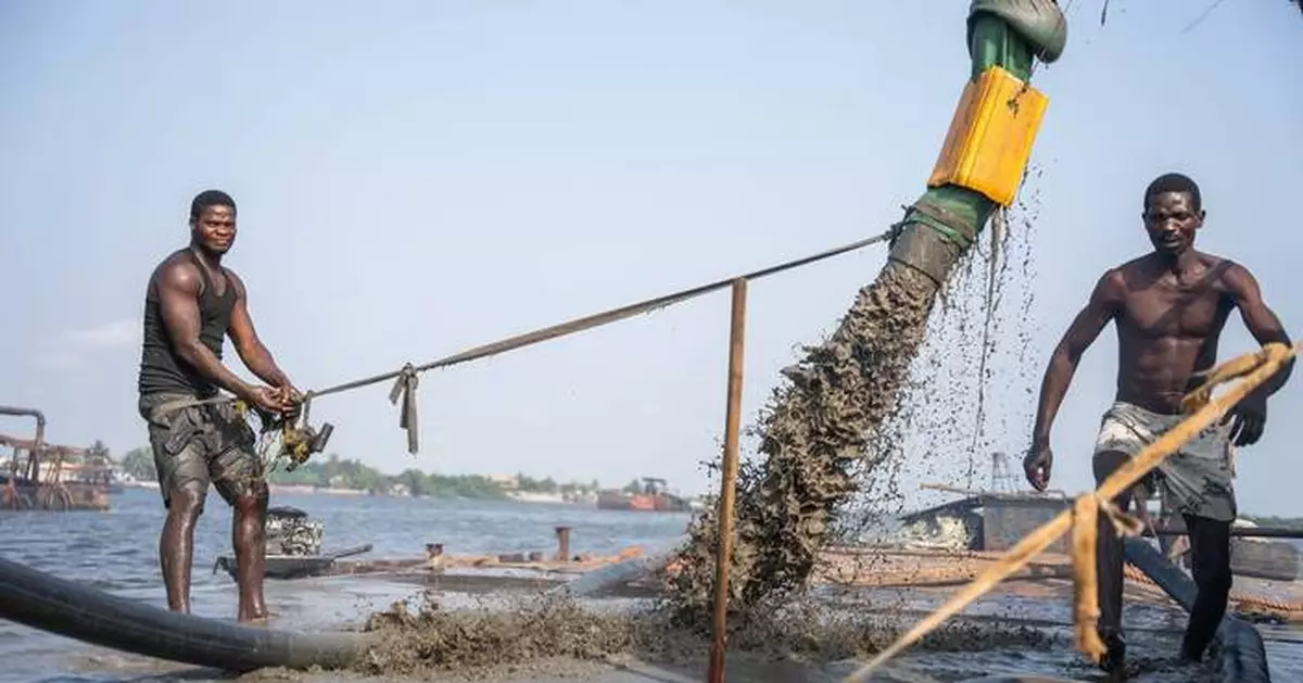 Photos of Nigerian sand dredgers reshaping Lagos' coastline, one bucket at a time