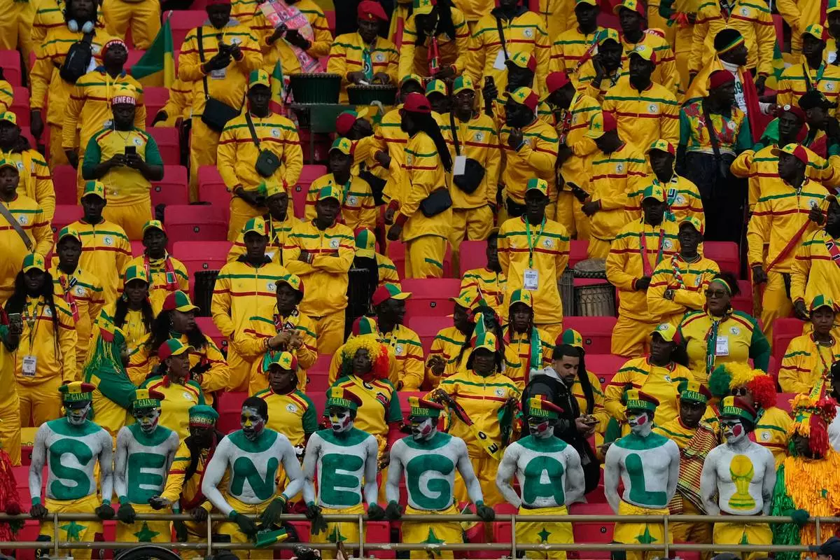 Senegal fans wait for the Africa Cup of Nations final soccer match between Senegal and Morocco, in Rabat, Morocco, Sunday, Jan. 18, 2026. (AP Photo/Mosa'ab Elshamy)