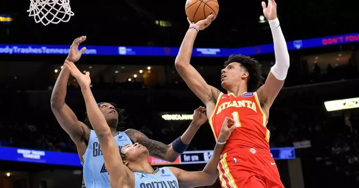 Jalen Johnson has 32 points, 15 rebounds to lead the Hawks to a 124-122 victory over the Grizzlies