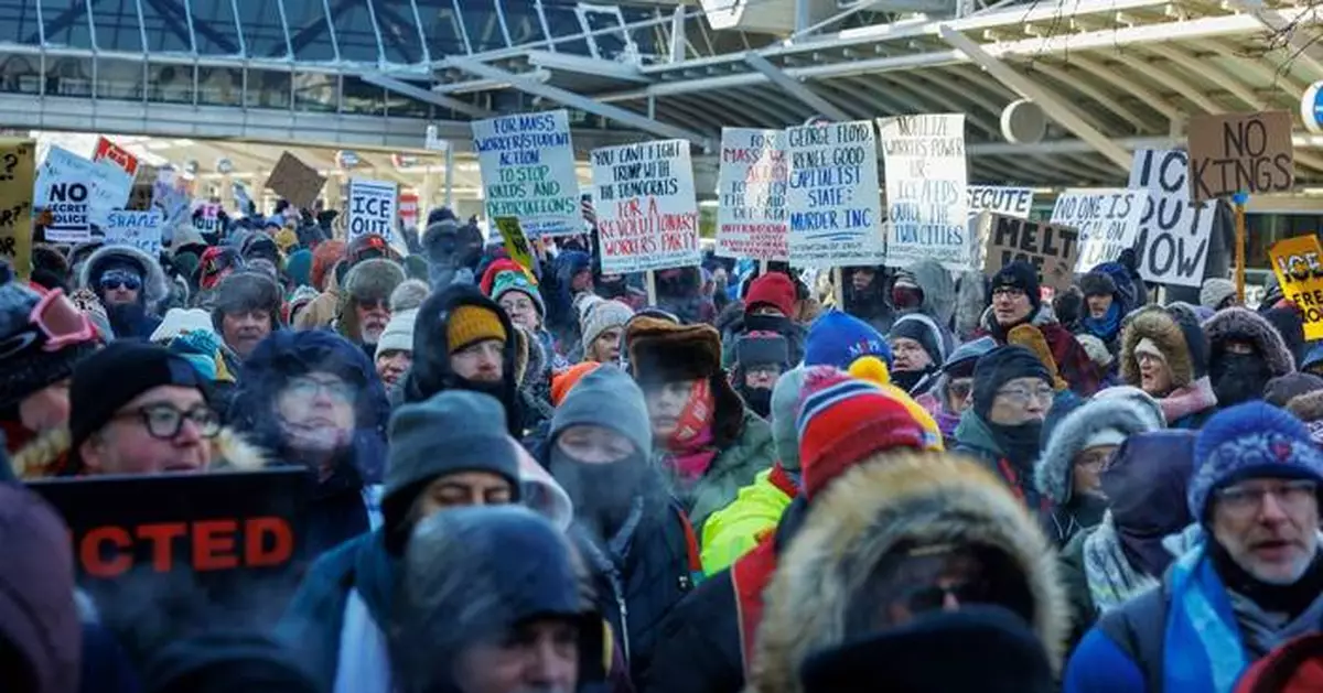 Police chief calls for calm after a man is shot and killed during Minneapolis immigration crackdown