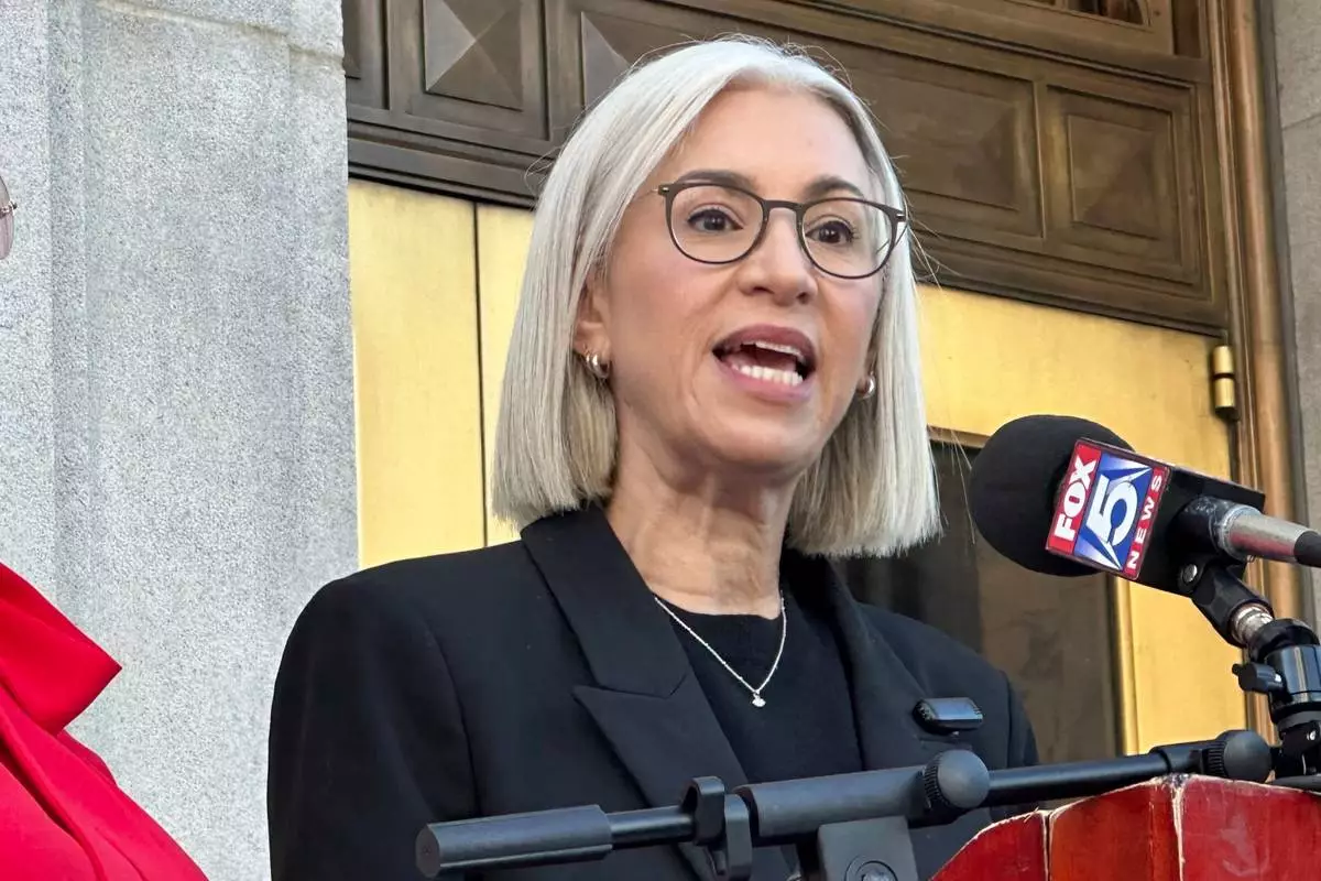 FILE - Fulton County Commissioner Dana Barrett speaks outside the Fulton County courthouse in Atlanta on Aug. 27, 2025. (AP Photo/Kate Brumback, File)