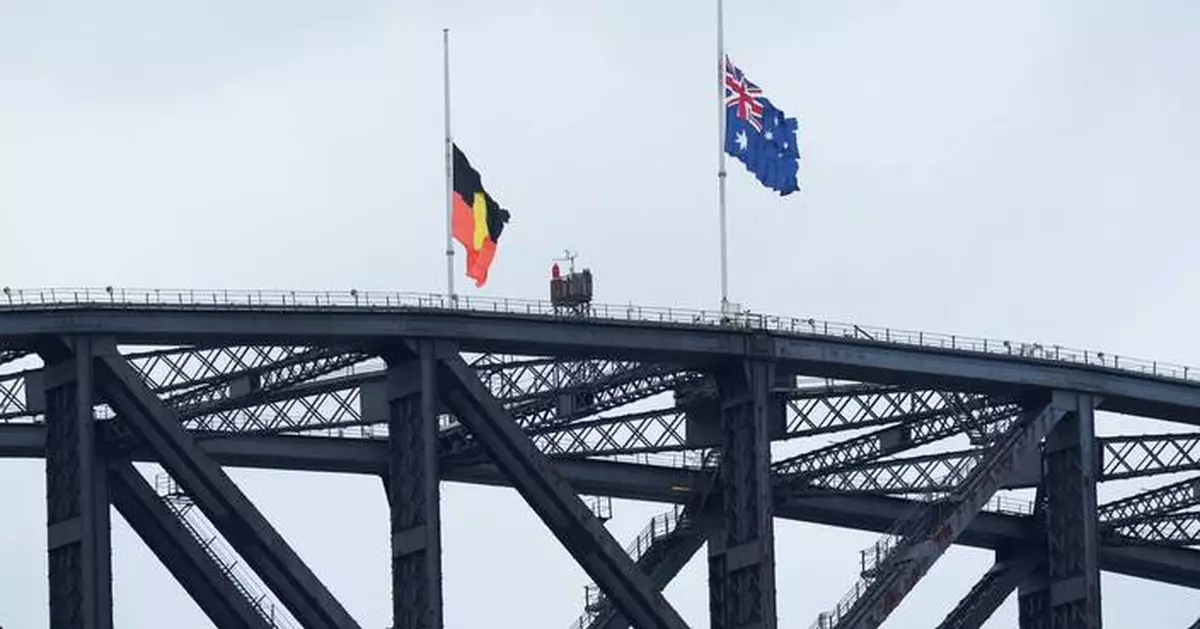 Police seek man wanted in fatal shootings of 3 in small Australian town