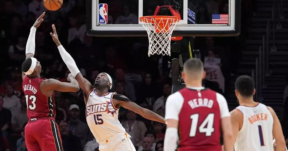 Adebayo scores 29, Heat waste 20-point lead before rallying to top Suns 127-121