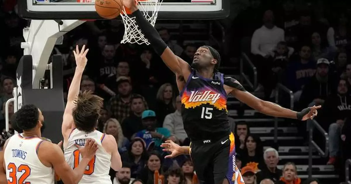 Booker scores 31 points, Brooks adds 27 as Suns hold on to beat Knicks 112-107