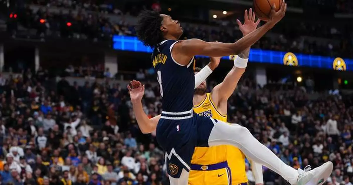 Doncic has a triple-double as the Lakers rally past the short-handed Nuggets, 115-107