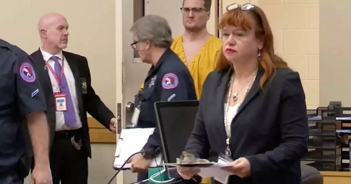 Illinois surgeon pleads not guilty to the killings of his ex-wife and her dentist husband in Ohio