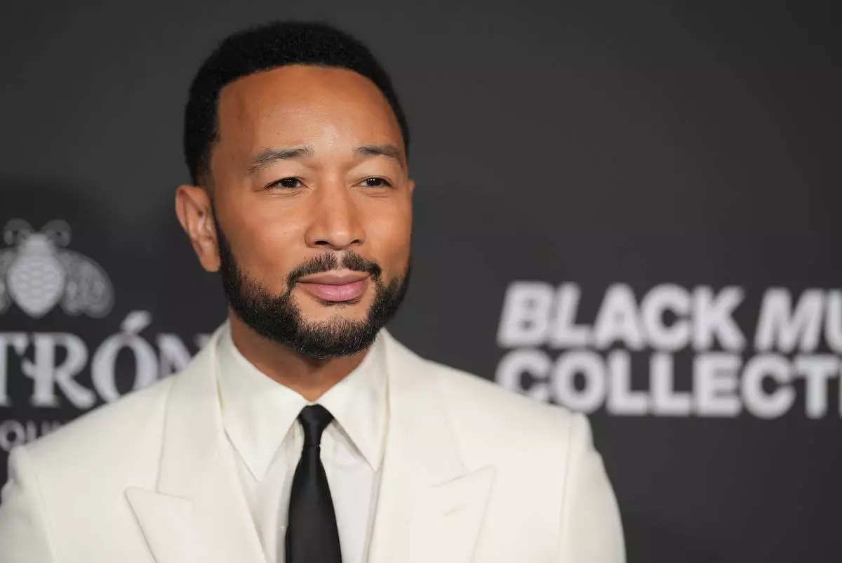 John Legend attends the Recording Academy Honors presented by the Black Music Collective on Thursday, Jan. 29, 2026, in Los Angeles. (Photo by Richard Shotwell/Invision/AP)