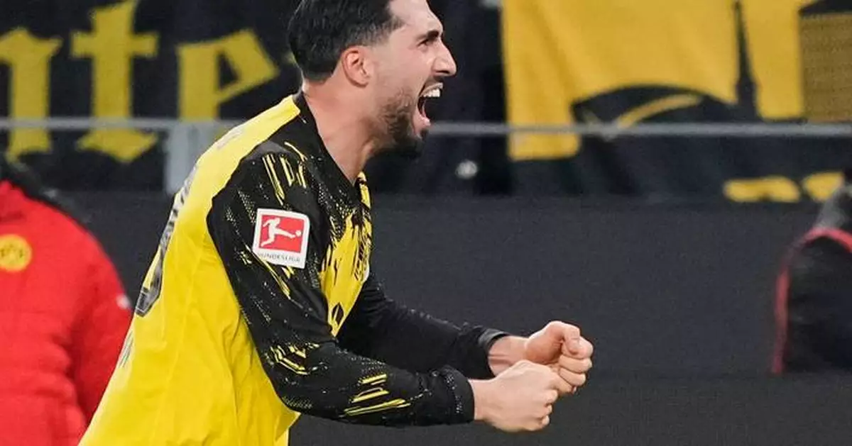 Emre Can's late penalty gives Dortmund win before Bayern plays Leipzig in Bundesliga