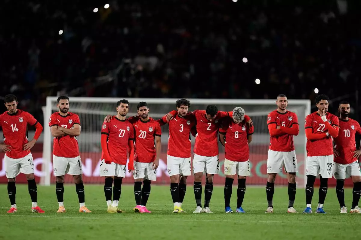 Egypt national team react during the penalty shoot out during the Africa Cup of Nations third place game between Egypt and Nigeria in Casablanca, Morocco, Saturday, Jan. 17, 2026. (AP Photo/Themba Hadebe)