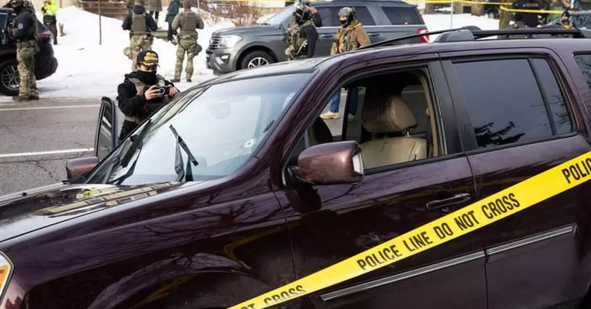 The Latest: ICE officer shoots and kills a woman during Minneapolis immigration crackdown