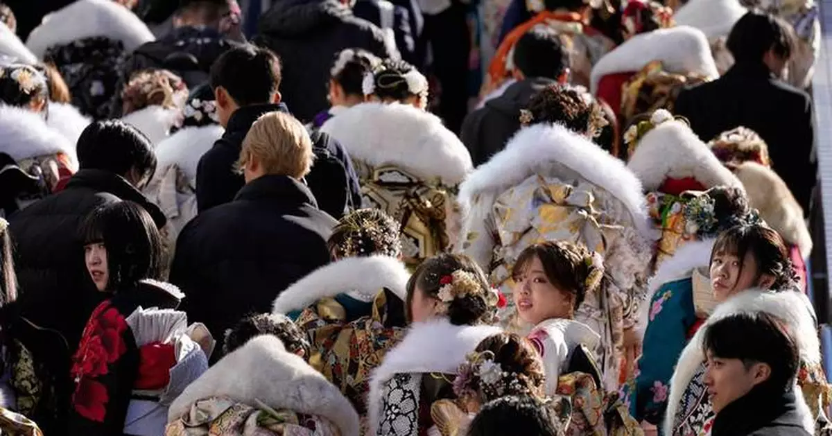 Photos of 20-year-olds gathering in kimonos for Coming of Age Day ceremony in Japan