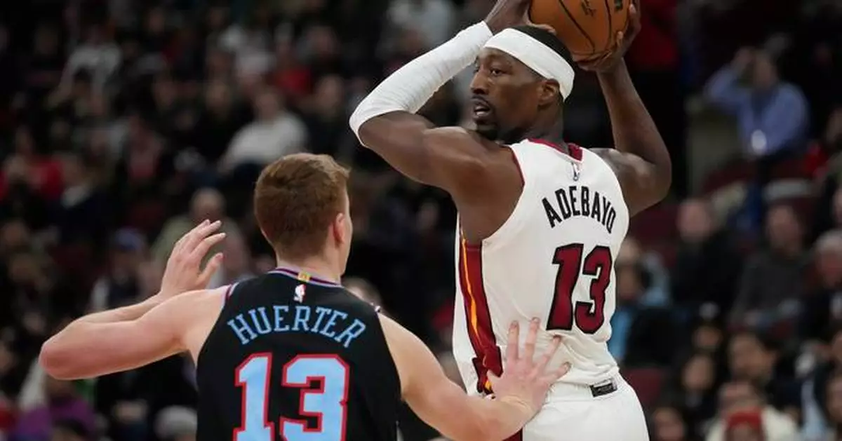 Powell scores 21 points and Heat outlast Bulls for 116-113 win