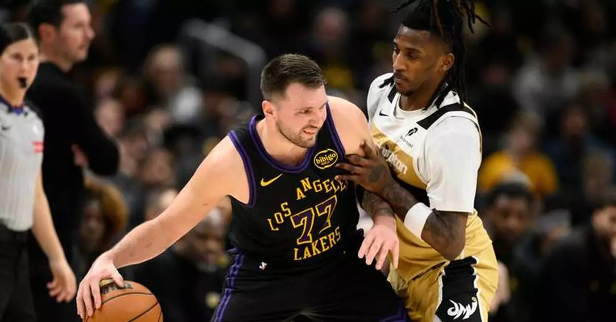 Luka Doncic has a triple-double (26 points, 11 assists, 10 rebounds) before halftime as Lakers roll