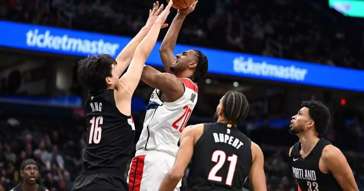 Sarr's big night helps the Wizards snap a 9-game skid with a 115-111 win over Portland