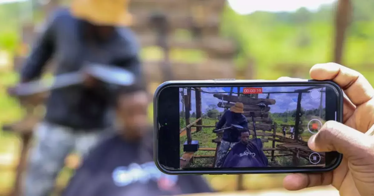A Kenyan barber who wields a sharpened shovel thrives on Africa's social media craze