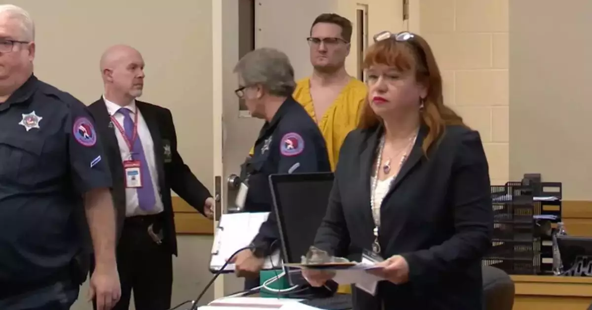 Doctor charged in killings of his ex-wife and her Ohio husband waives right to extradition hearing