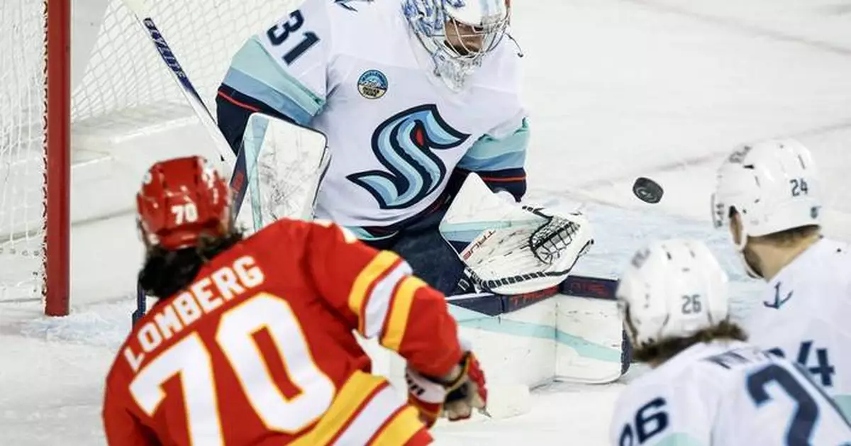 Red-hot Grubauer backstops streaking Kraken to 5-1 win over Flames