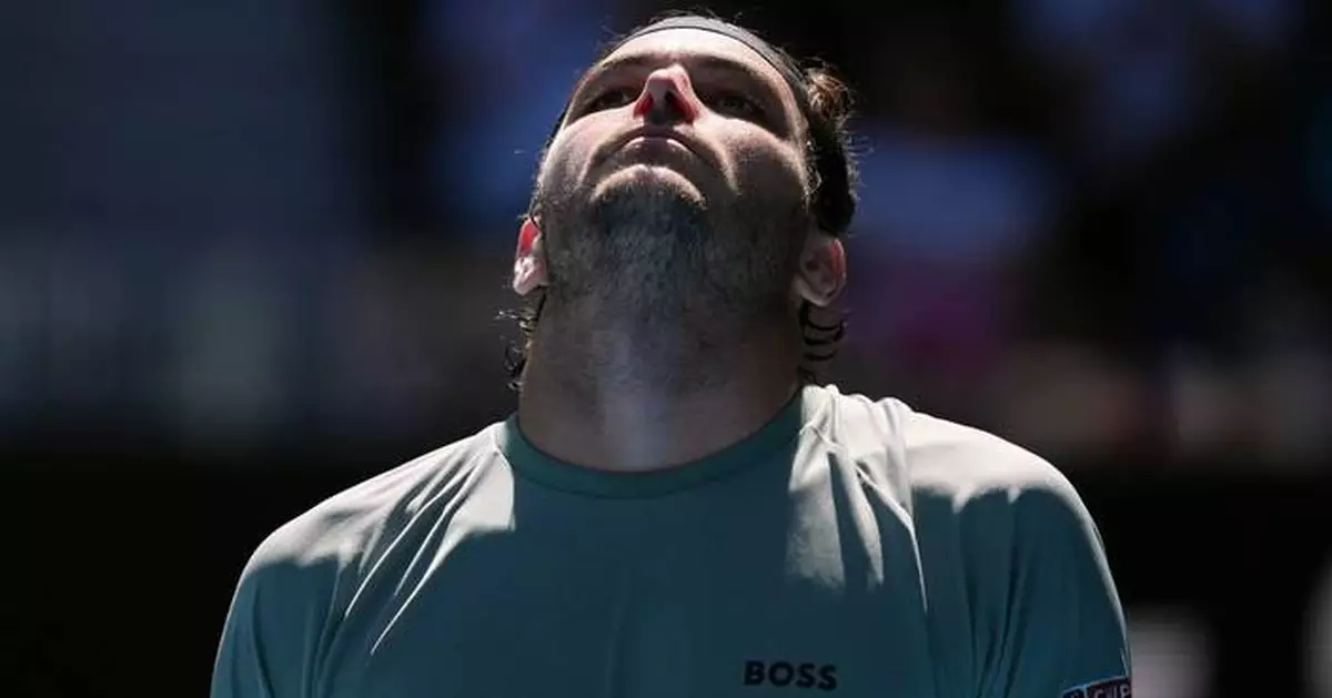 Taylor Fritz struggles with injury in loss to Lorenzo Musetti at Australian Open