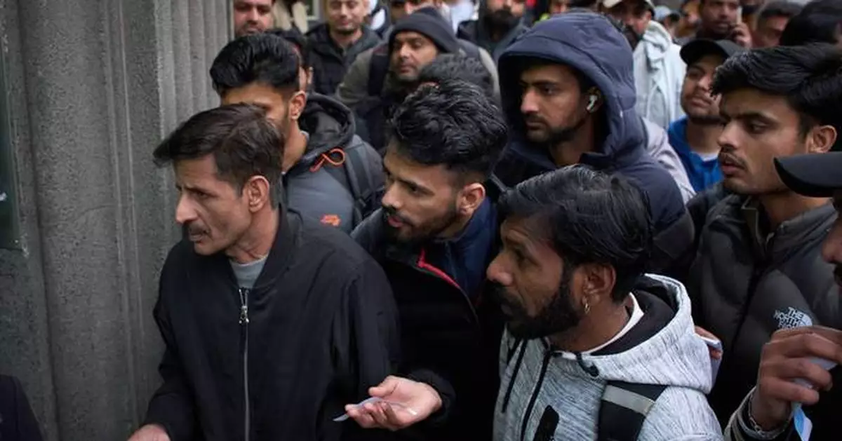 Spain offers hundreds of thousands of immigrants a way to stay legally. But who are they?