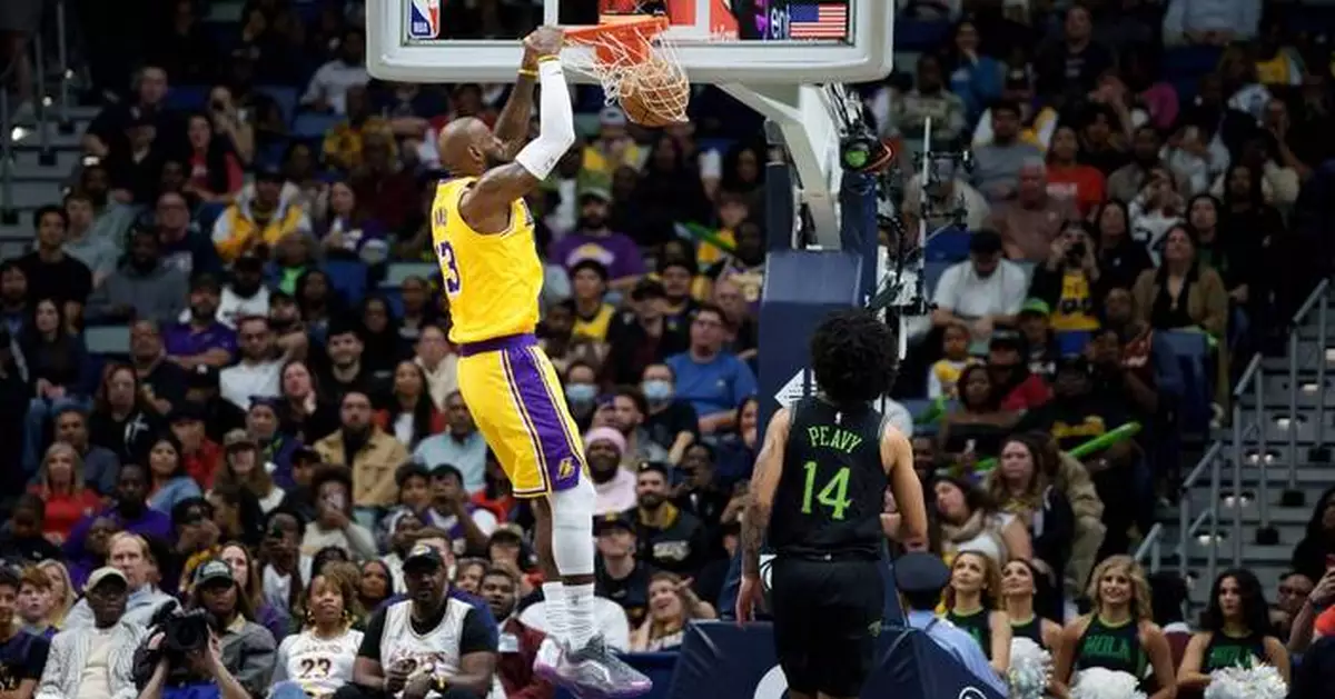 James and Doncic each score 30 to help the Lakers hold off the Pelicans 111-103