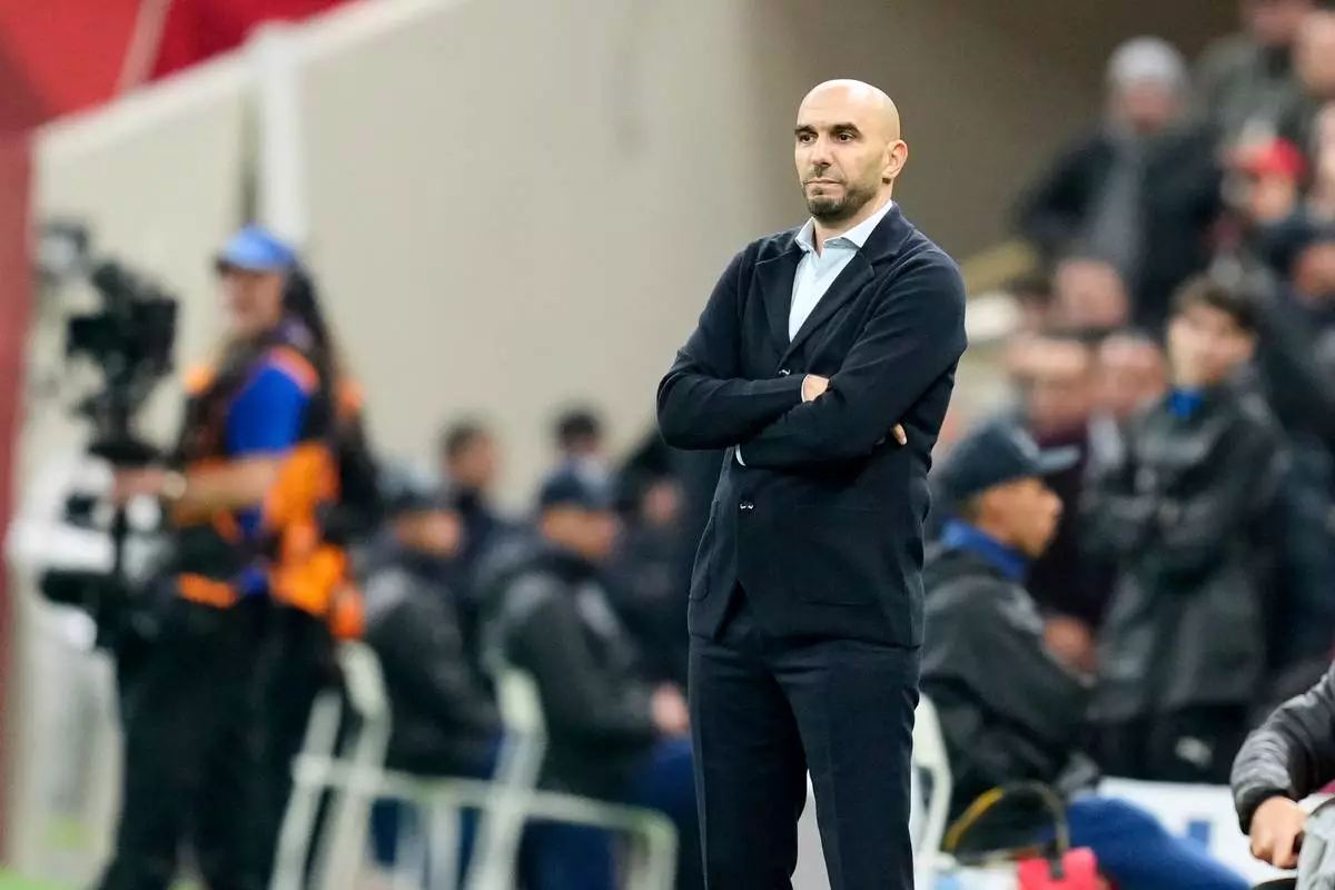 Morocco's head coach Walid Regragui observes during the Africa Cup of Nations quarterfinal soccer match between Cameroon and Morocco, in Rabat, Morocco, Friday, Jan. 9, 2026. (AP Photo/Mosa'ab Elshamy)