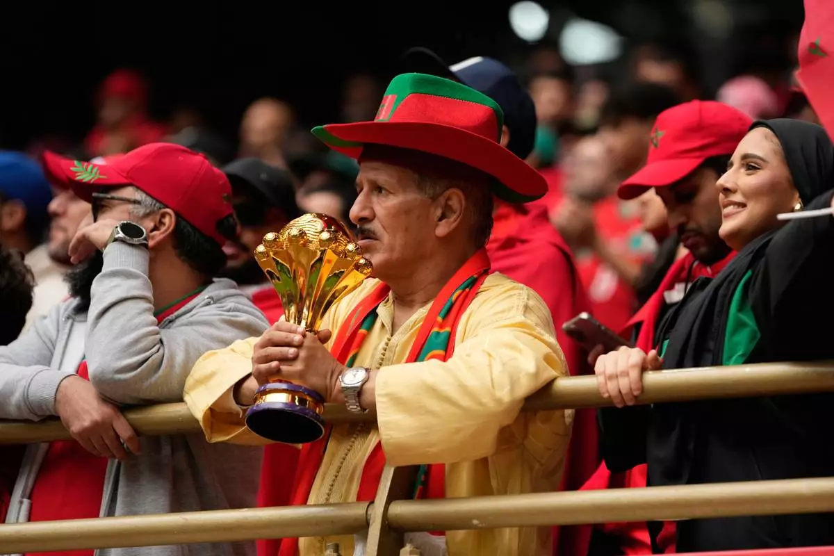 Moroccan fans watch the Africa Cup of Nations round of 16 soccer match between Morocco and Tanzania in Rabat, Morocco, Sunday, Jan. 4, 2026. (AP Photo/Mosa'ab Elshamy)
