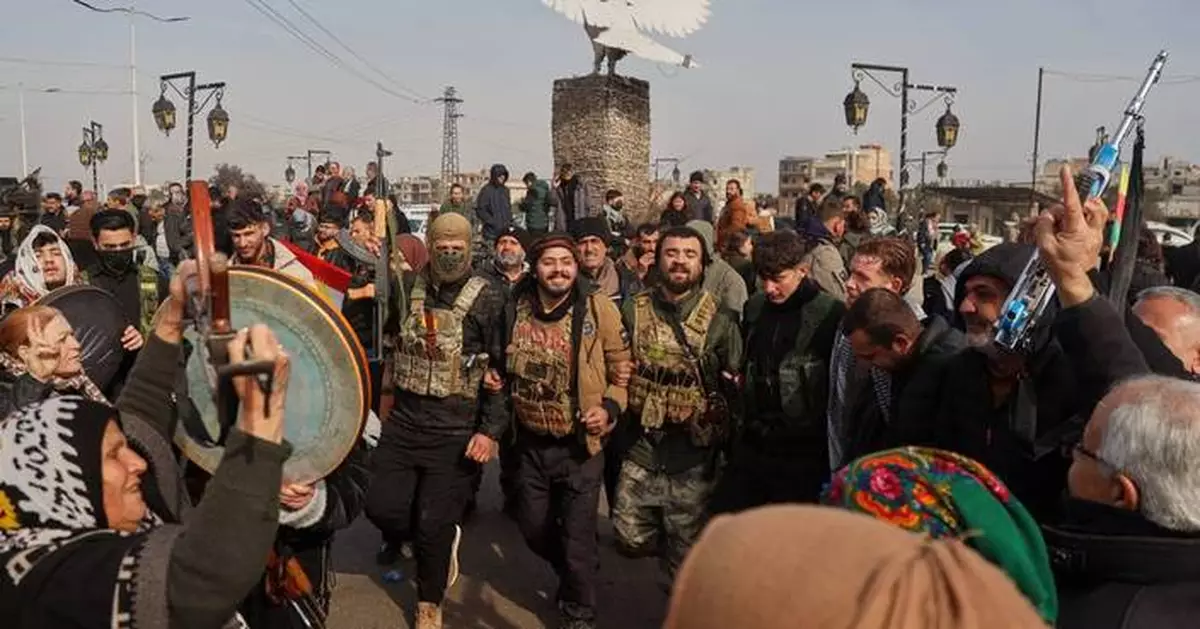 UN aid convoy delivers supplies to besieged city in northeast Syria as a shaky ceasefire holds