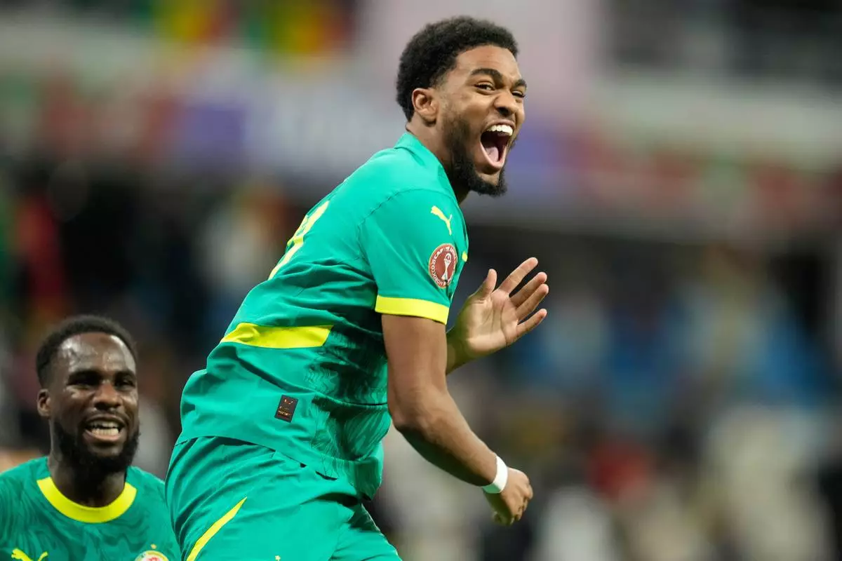 Senegal's Ibrahim Mbaye celebrates after scoring during the Africa Cup of Nations best of 16 soccer match between Senegal and Sudan in Tangier, Morocco, Saturday, Jan. 3, 2026. (AP Photo/Mosa'ab Elshamy)