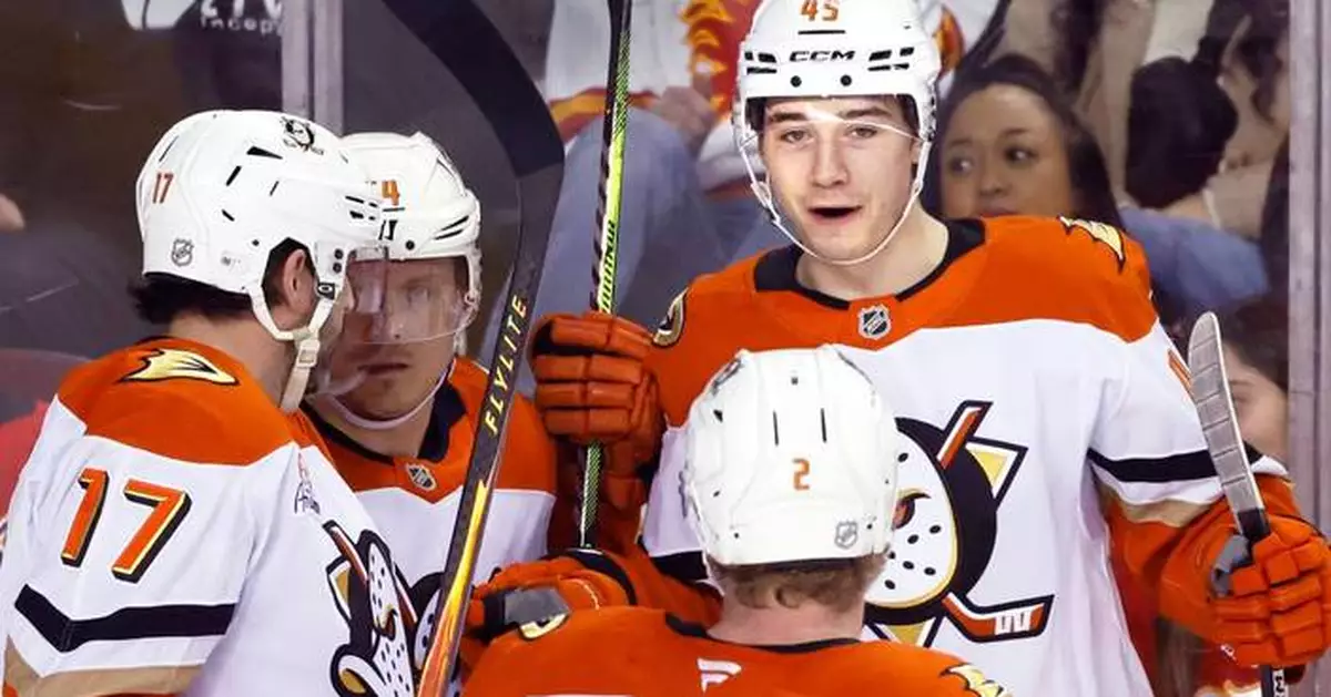 Sennecke scores in OT for 1st NHL hat trick as Ducks rally to beat Flames 4-3