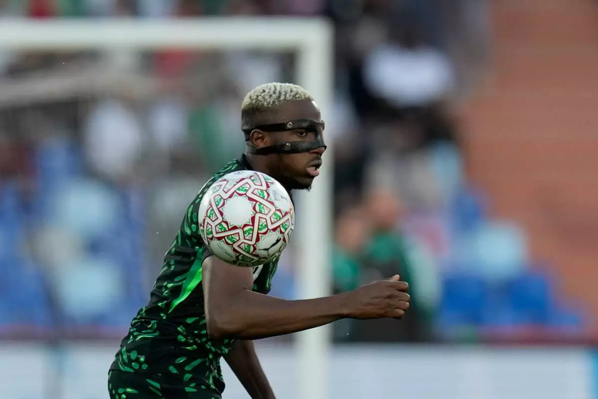 Nigeria's Victor Osimhen controls the ball during the Africa Cup of Nations quarterfinal soccer match between Nigeria and Algeria, in Marrakech, Morocco, Saturday, Jan. 10, 2026. (AP Photo/Themba Hadebe)