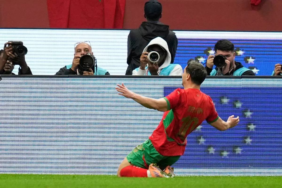 Morocco's Brahim Abdelkader Diaz celebrates after scoring the opening goal during the Africa Cup of Nations round of 16 soccer match between Morocco and Tanzania in Rabat, Morocco, Sunday, Jan. 4, 2026. (AP Photo/Mosa'ab Elshamy)