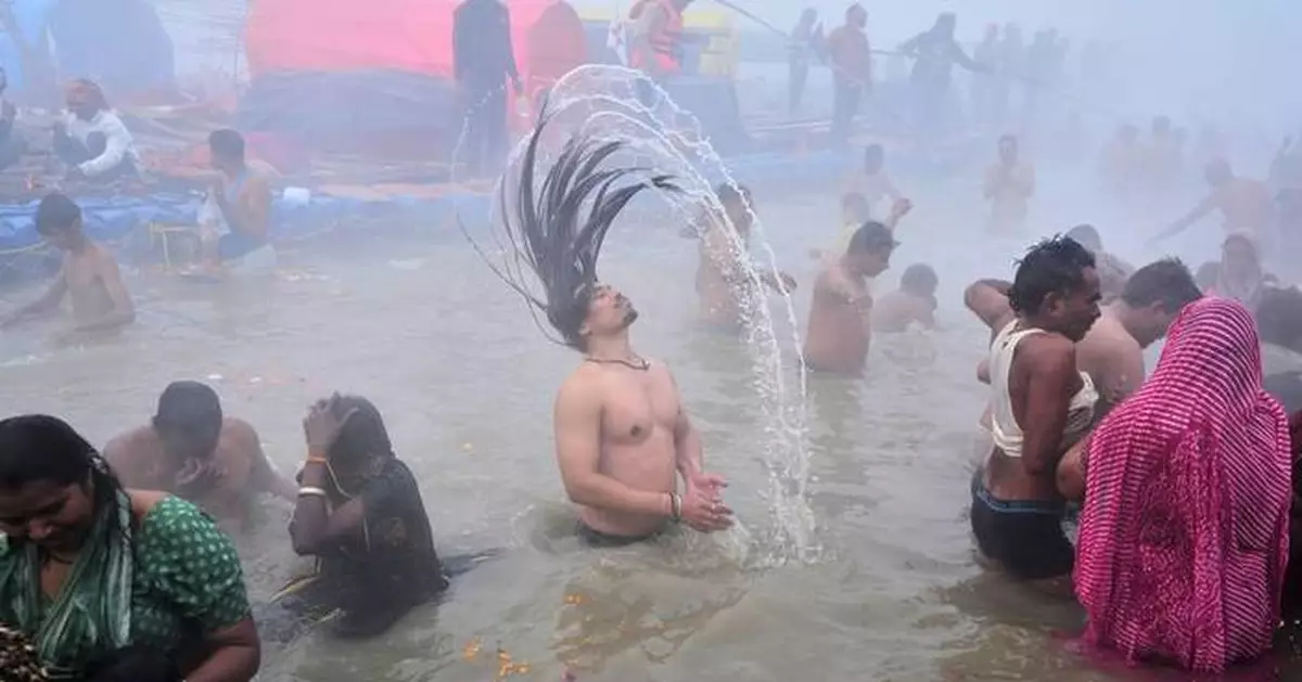 Photos show devotees taking a holy dip at Sangam during Mauni Amavasya festival in India