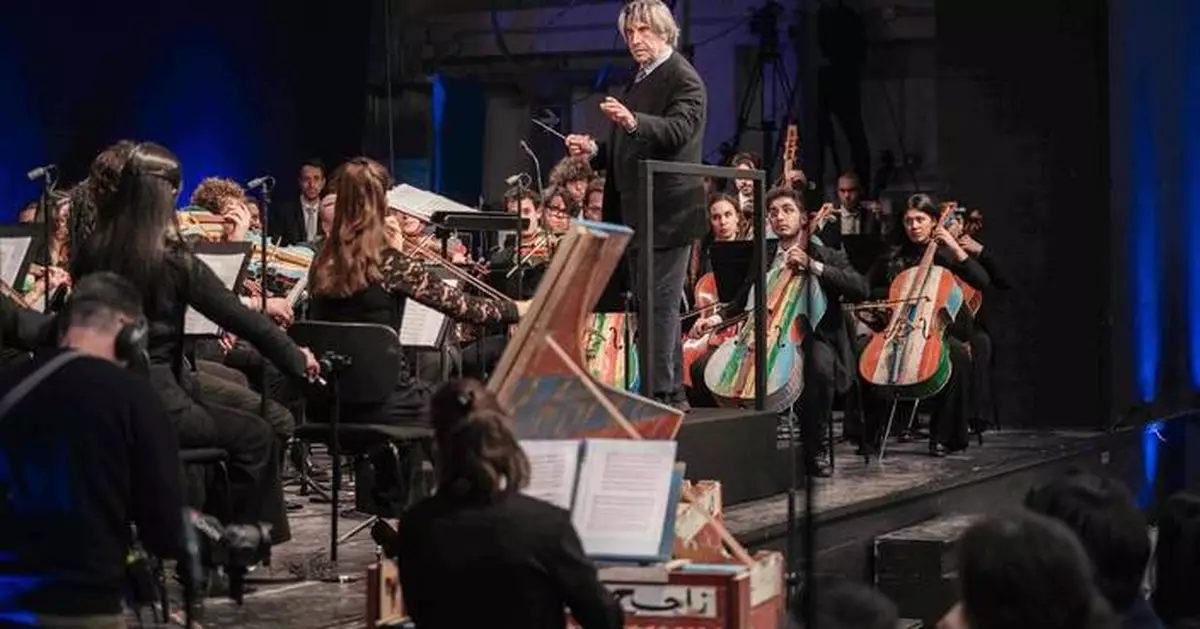 Milan prison hosts concert with instruments made by inmates from migrant smugglers’ boats