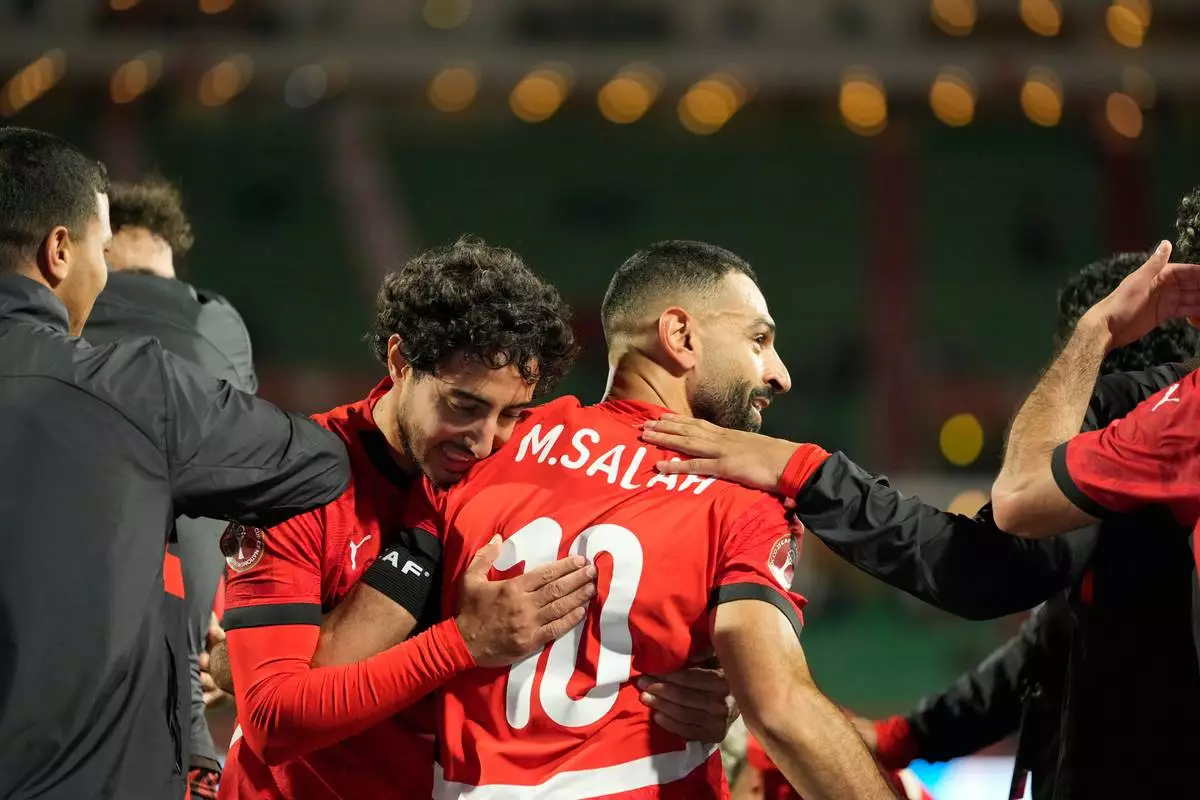 Egypt's Mohamed Salah celebrates after scoring his side's third goal during the Africa Cup of Nations round of 16 soccer match between Egypt and Benin in Agadir, Morocco, Monday, Jan. 5, 2026. (AP Photo/Mosa'ab Elshamy)