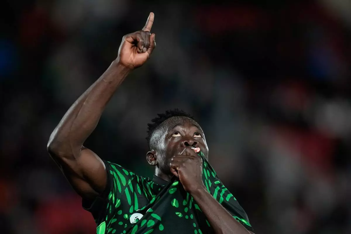 Nigeria's Akor Adams celebrates after scoring his side's fourth goal during the Africa Cup of Nations round of 16 soccer match between Nigeria and Mozambique in Fez, Morocco, Monday, Jan. 5, 2026. (AP Photo/Themba Hadebe)