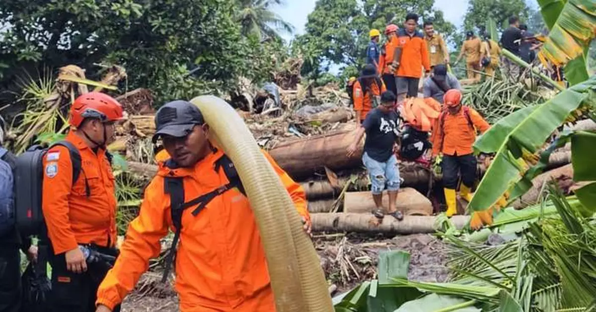 Flash floods in Indonesia kill at least 16 people and sweep away homes