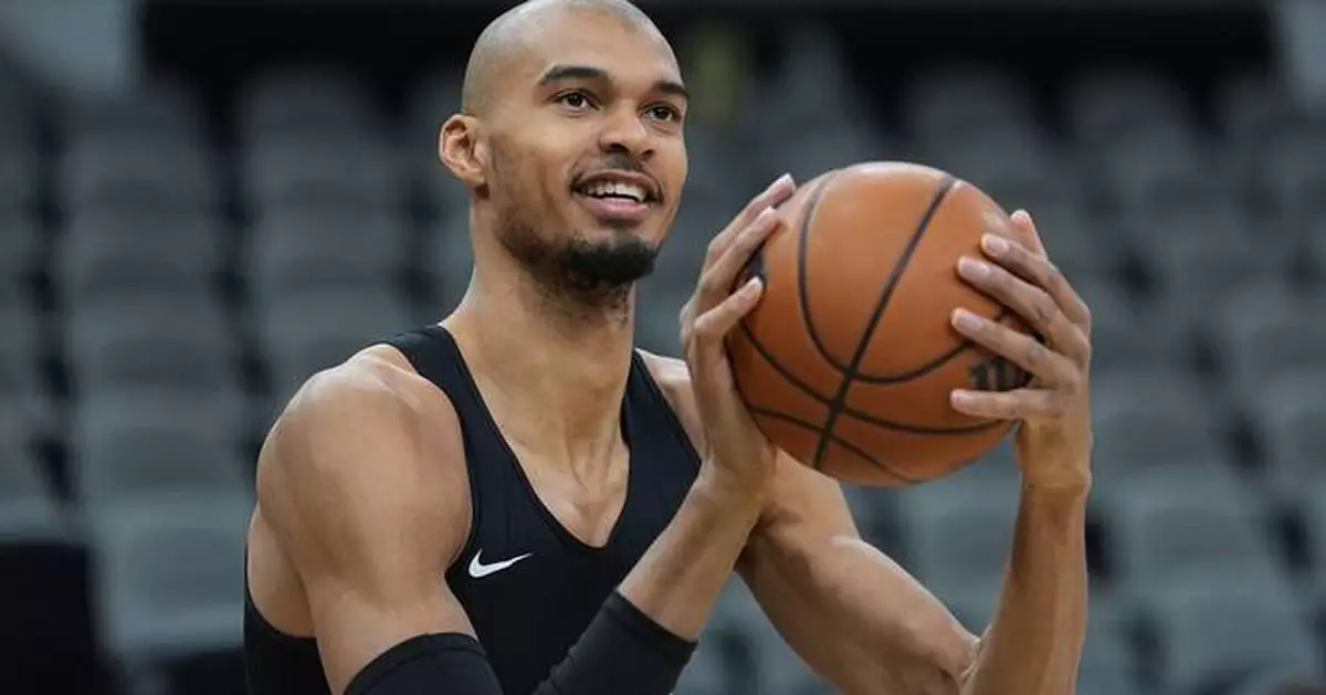 Wembanyama shaves head, shines brightly in leading Spurs past Antetokounmpo, Bucks