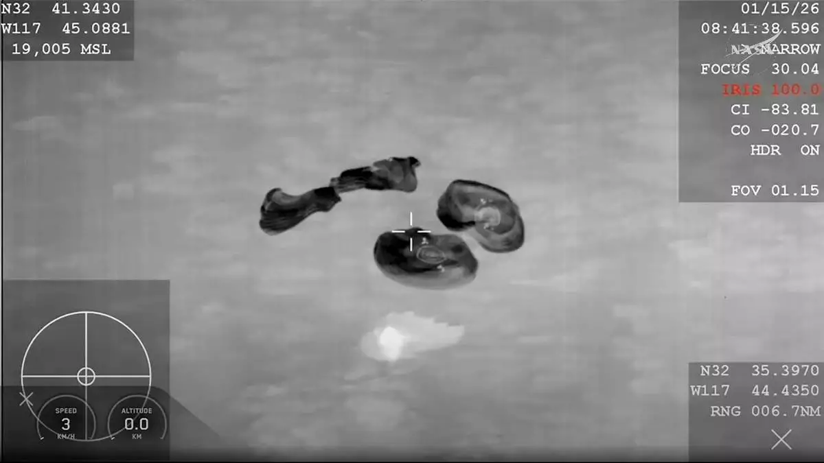 This screengrab from video provided by NASA shows the NASA's SpaceX Crew-11 members re entering the earth in a middle-of-the-night splashdown near San Diego, Calif., Thursday, Jan. 15, 2026. (NASA via AP)