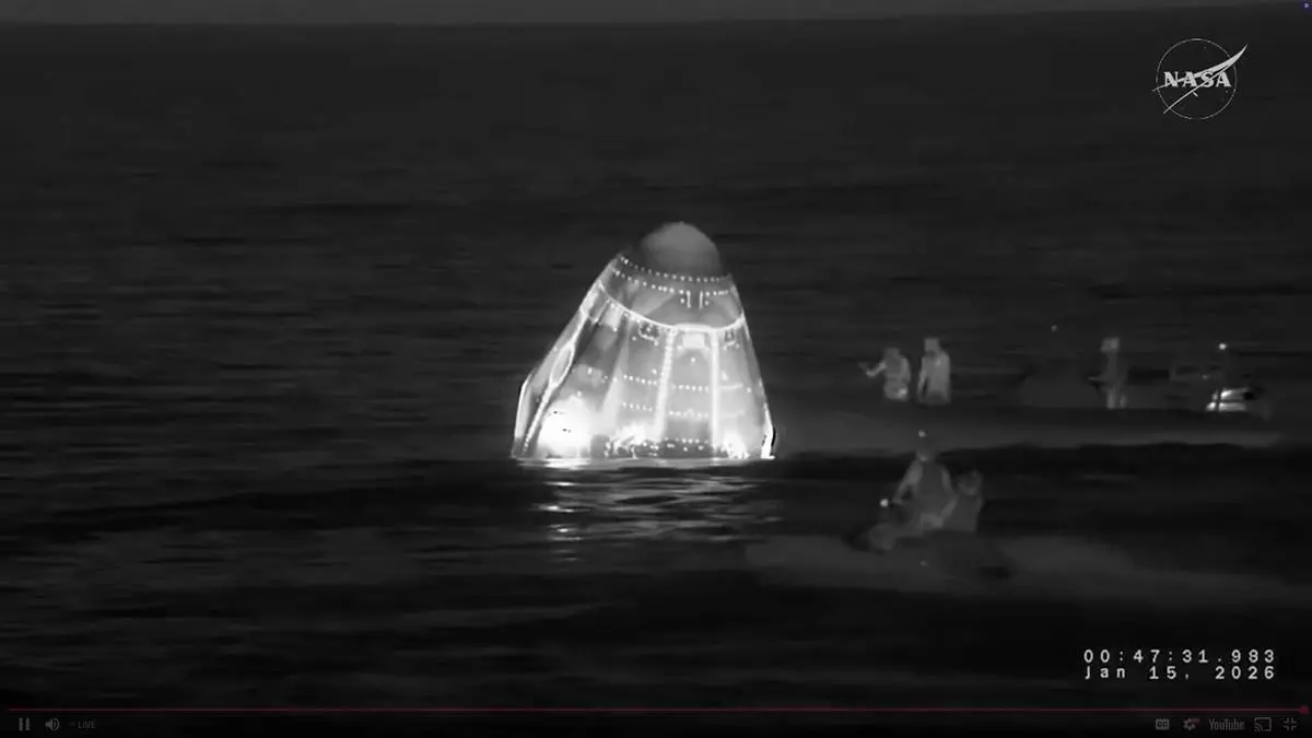 This screengrab from video provided by NASA shows recovery vessels approaching the NASA's SpaceX Crew-11 capsule to evacuate one of the crew members after they re-entered the earth in a middle-of-the-night splashdown near San Diego, Calif., Thursday, Jan. 15, 2026. (NASA via AP)