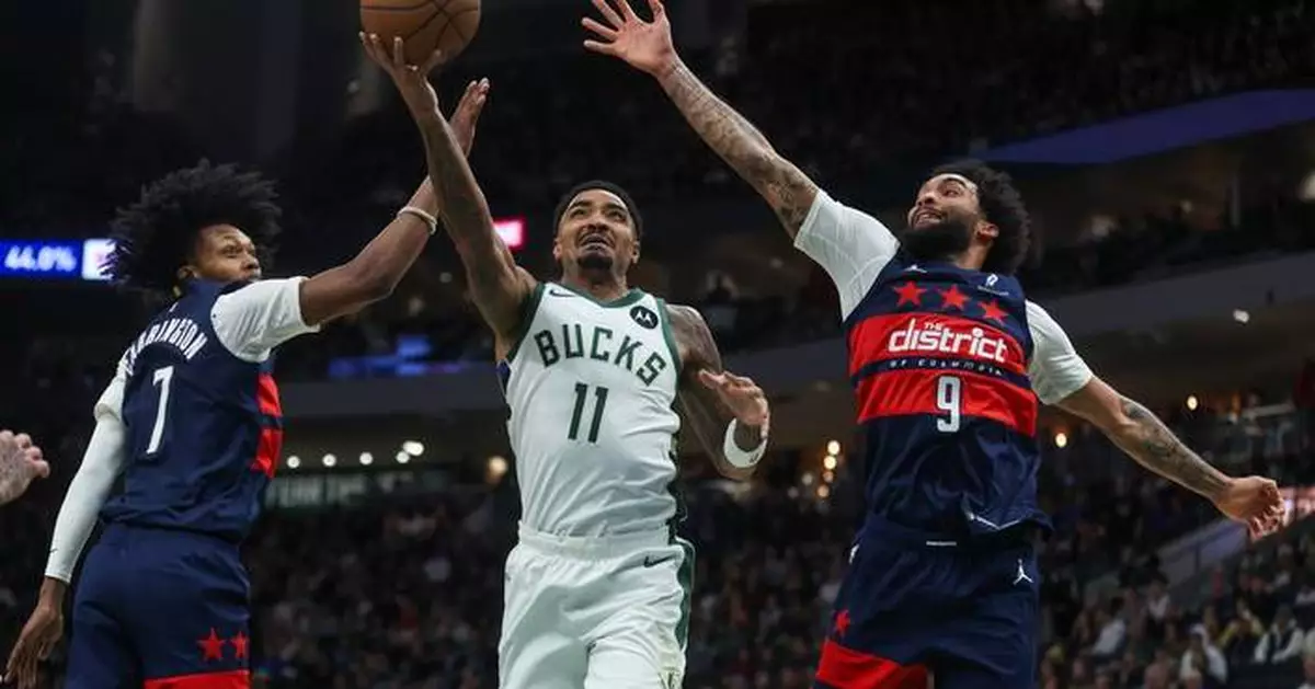 McCollum's jumper in final seconds leads Wizards to a 114-113 win over the Bucks