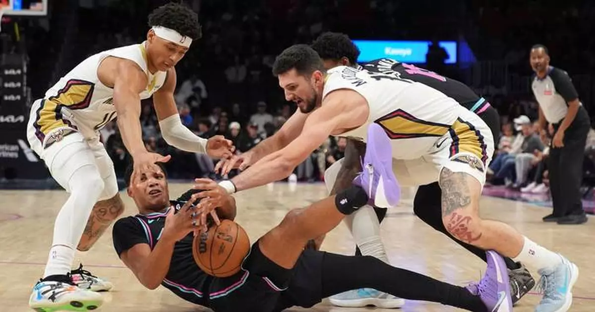 Powell makes career-high nine 3-pointers as Heat beat Pelicans 125-106