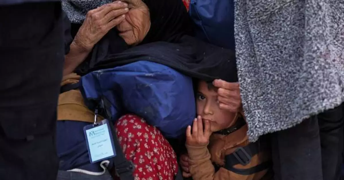 Photos show Syrians returning home following clashes between government forces and Kurdish fighters