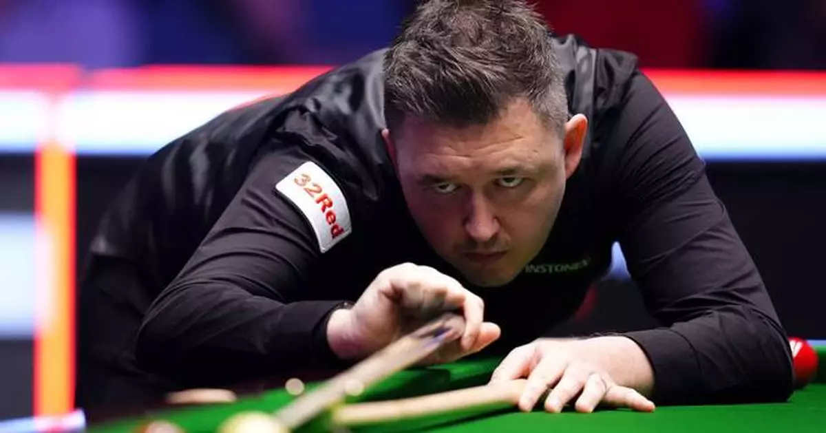Kyren Wilson beats 50-year-old John Higgins to win Masters snooker tournament