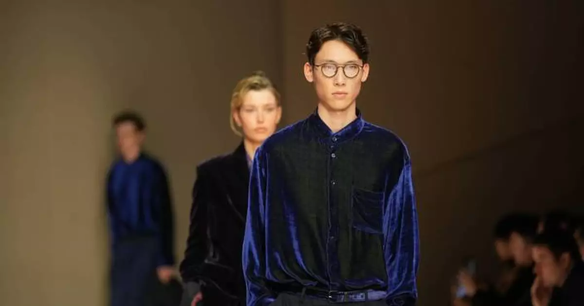 Giorgio Armani launches new era with iridescent colors and a star-studded front row