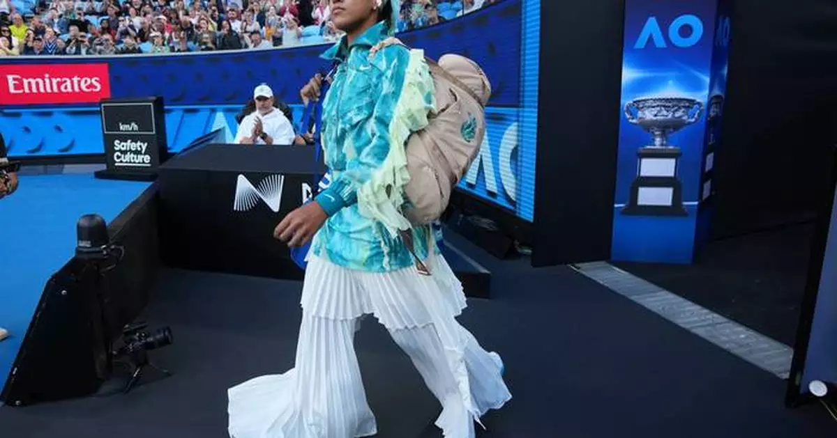 Naomi Osaka tones down her walk-on outfit. Turns up the heat at Australian Open