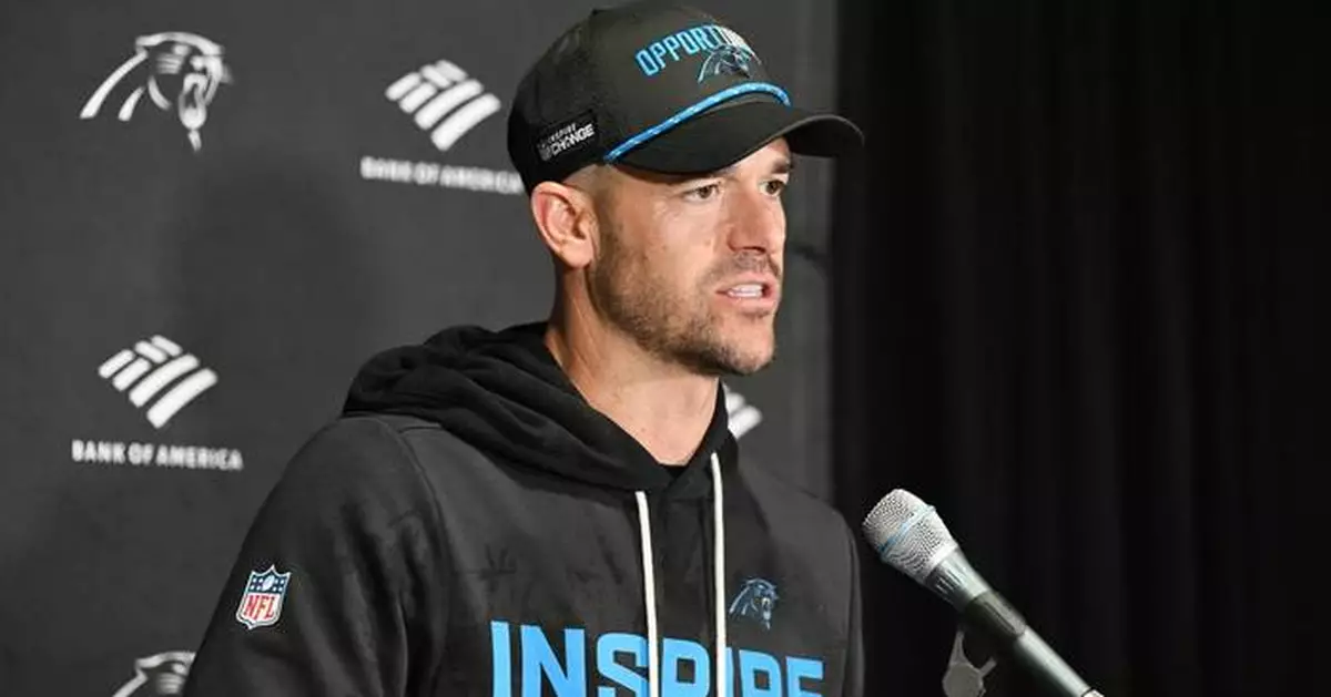 Dave Canales and the Panthers celebrate Falcons' win that gave Carolina the NFC South title